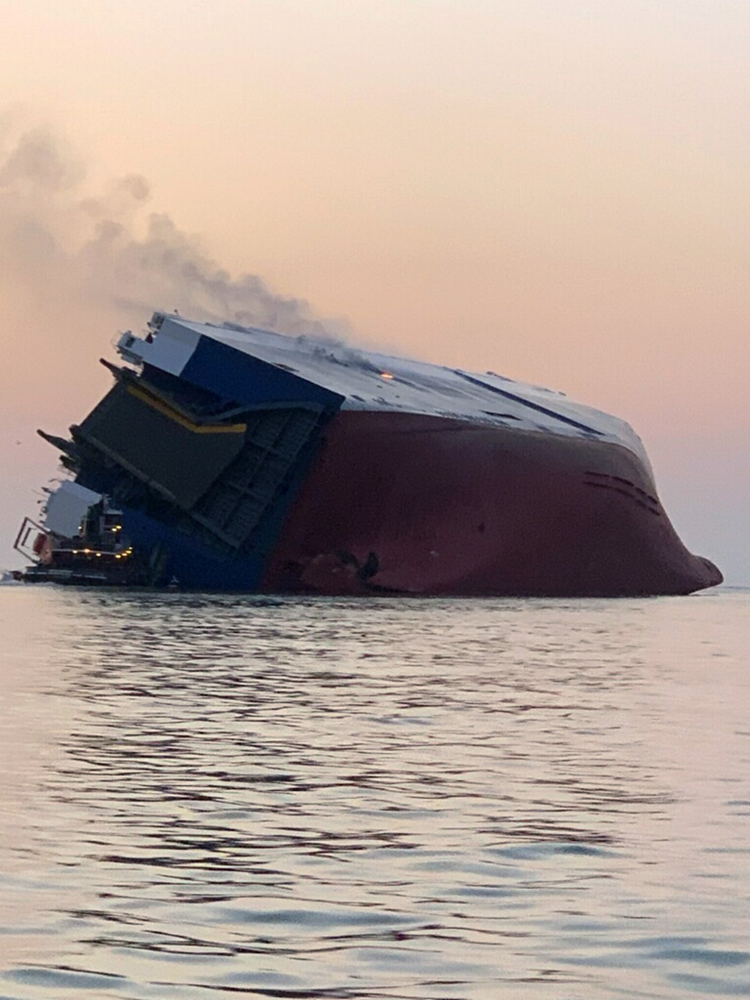 The Golden Ray, a massive cargo ship, caught fire and capsized on the St. Simons Sound off the coast of Georgia in the early hours of Sunday, Sept. 8, 2019. The 656-foot-long cargo ship was transporting automobiles, South Korea's foreign ministry said.