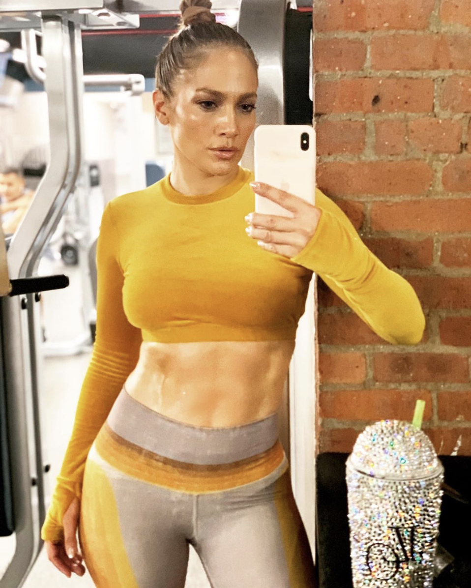 Jennifer Lopez flaunts her toned abs after a 